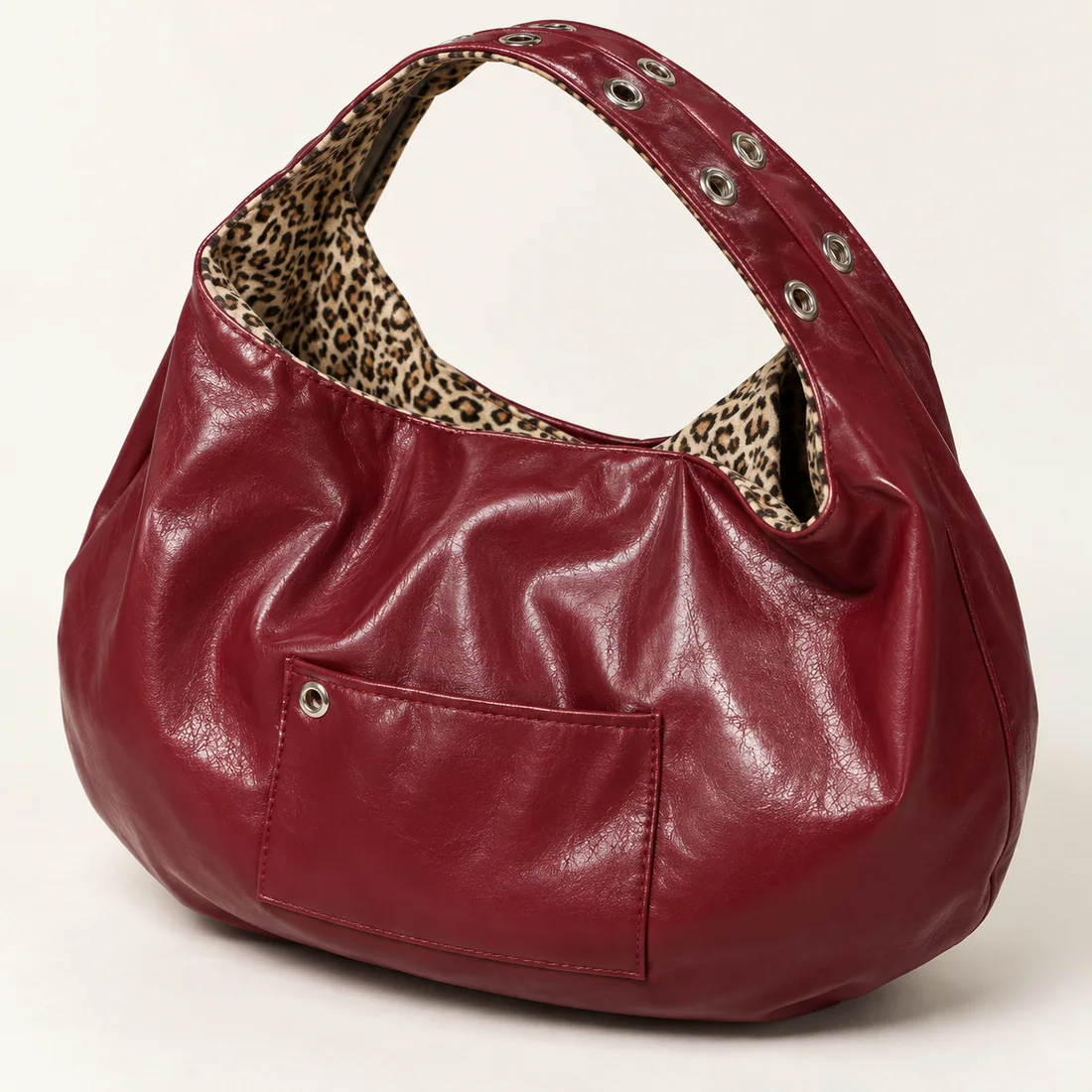 Sac bordeaux double face léopard · détail du motif